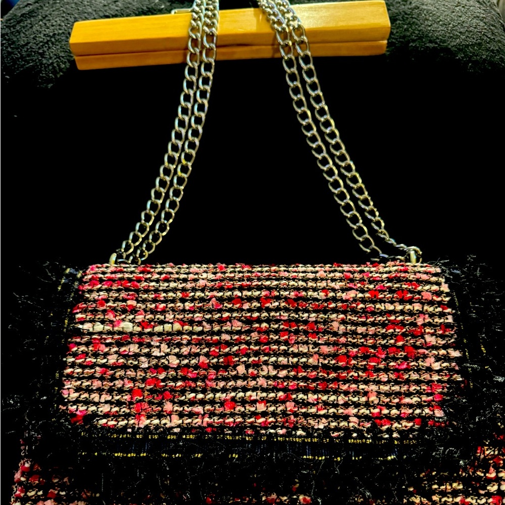 Selling used one time Paco Toro black and fuchsia handbag